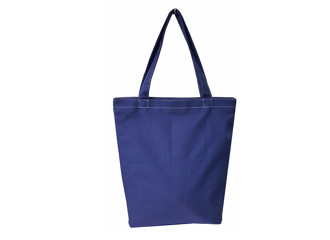 Back of Canvas Tote Bag in Dark Blue & white