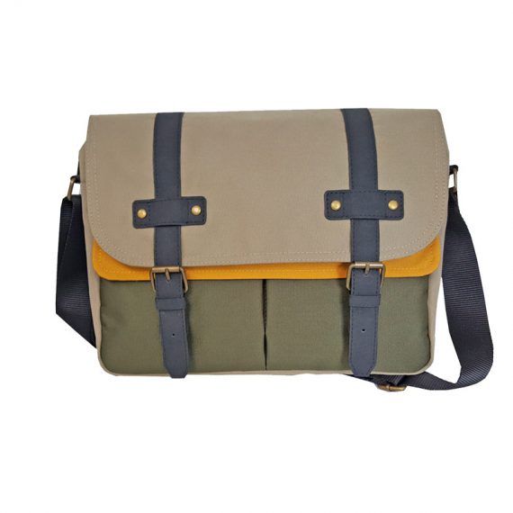 Messenger bag with magnetic button closure