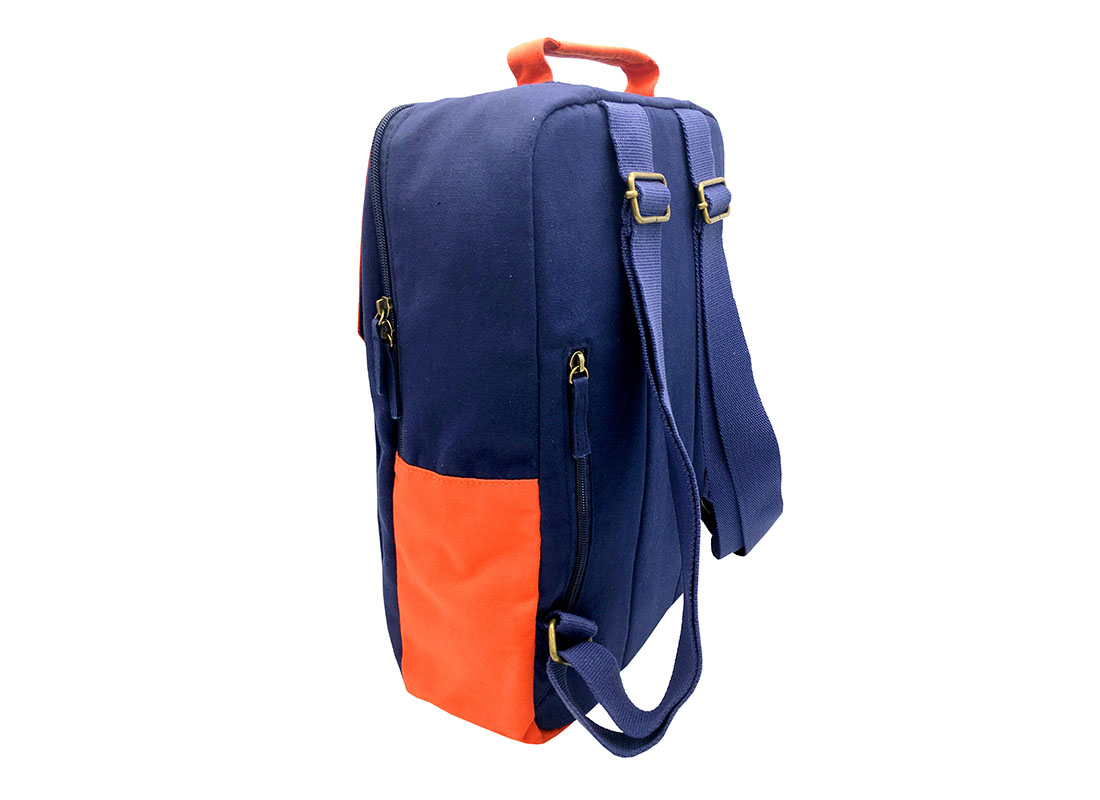 canvas backpack in dark blue with orange flap back side