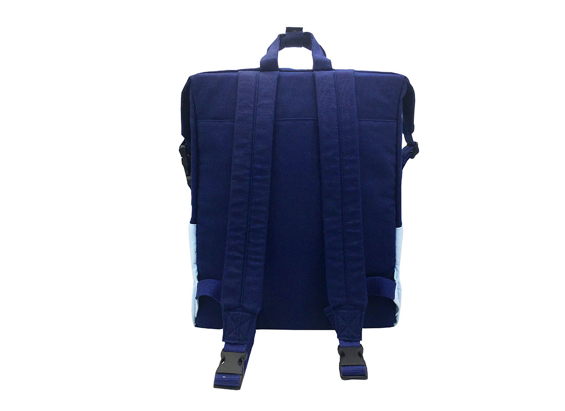 Two way canvas backpack in light & dark blue back